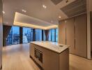 Modern kitchen with island and city view