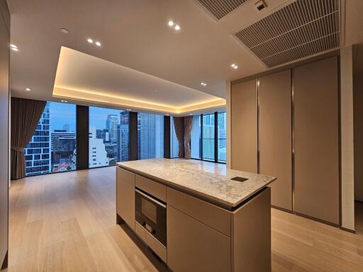 Modern kitchen with island and city view