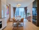 Modern open-plan kitchen and dining area with a view of the city