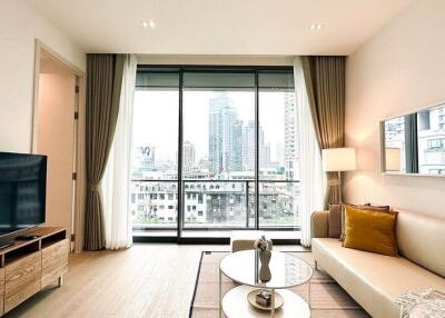 Modern living room with large window view of the city