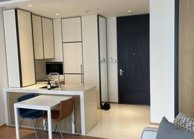 Modern kitchen area with dining table
