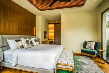 Modern bedroom with wooden accents and ceiling fan