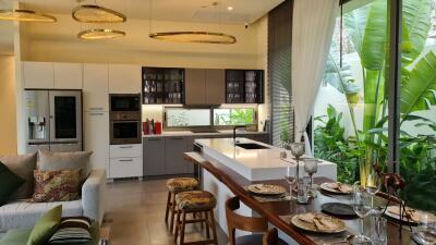 Modern kitchen with island and dining area