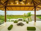 Open living area with wooden ceiling and scenic view