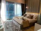 Modern bedroom with balcony access and decorative elements