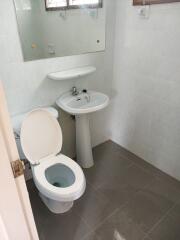 Small bathroom with toilet and sink