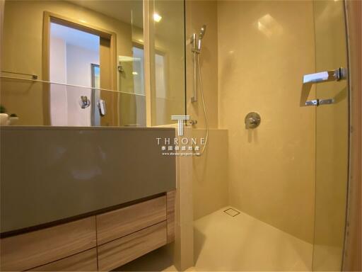 Modern bathroom with glass shower and vanity