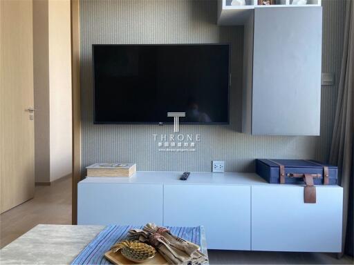 Living room with mounted TV and modern decor