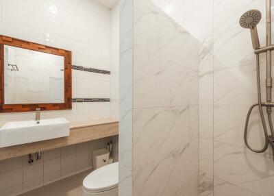 Modern bathroom with shower and large sink