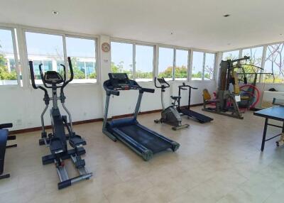 Spacious home gym with equipment