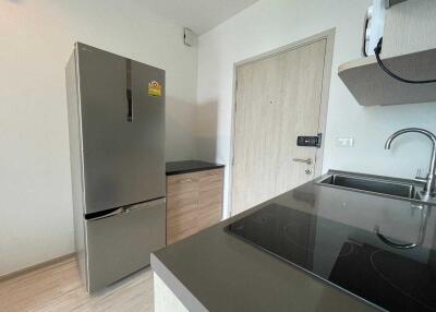 Modern kitchen with stainless steel appliances