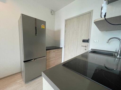 Modern kitchen with stainless steel appliances