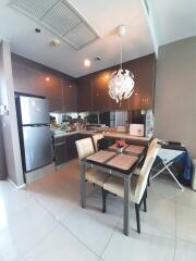 Modern kitchen with dining table