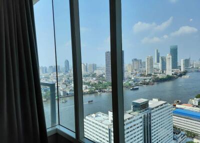 City view from high-rise apartment with large windows