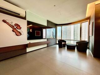 Modern living room with natural light and city view