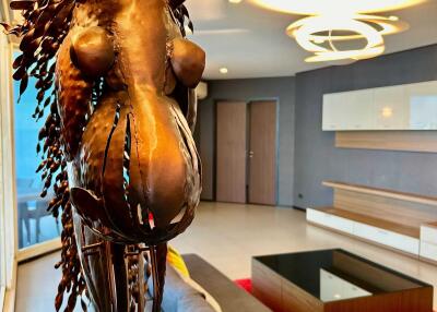 Modern living room with artistic horse sculpture