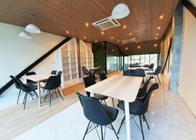 Modern dining area with tables and chairs