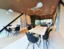 Modern dining area with tables and chairs