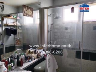 Bathroom with shower and toiletries
