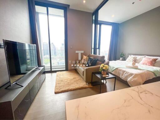 Modern studio apartment with combined living and sleeping area.