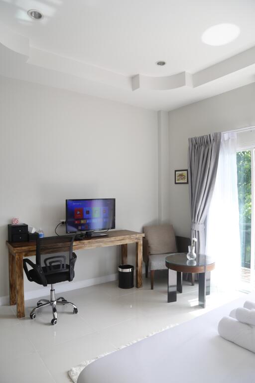 Modern bedroom with a study area