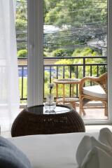 Bedroom with a view of the outdoor patio