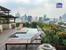 Rooftop terrace with city view and pool