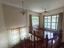 Spacious living room with natural light and balcony access