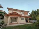 Two-story residential house with garden