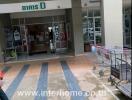 Entrance of a commercial building with shopping carts