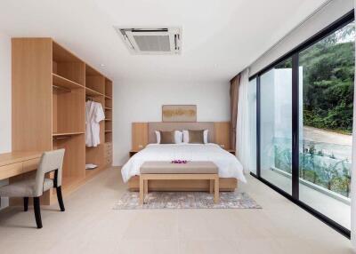 Spacious, modern bedroom with large window