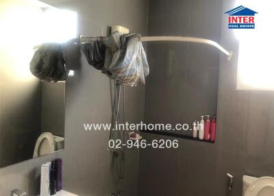 Bathroom with shower and toiletries