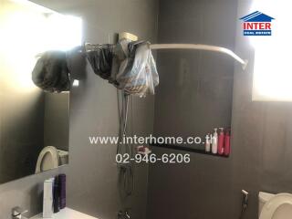 Bathroom with shower and toiletries