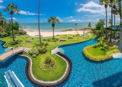 Beachfront property with a pool and garden area