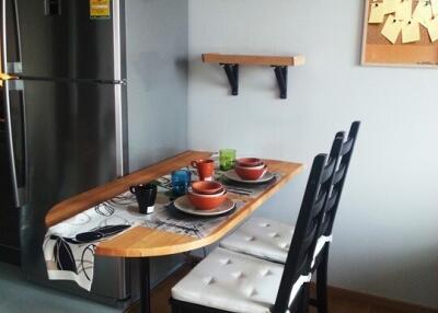 Cozy kitchen dining area with table and chairs