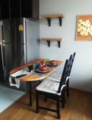 Cozy kitchen dining area with table and chairs