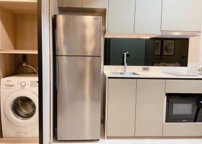 Modern kitchen with appliances and washer