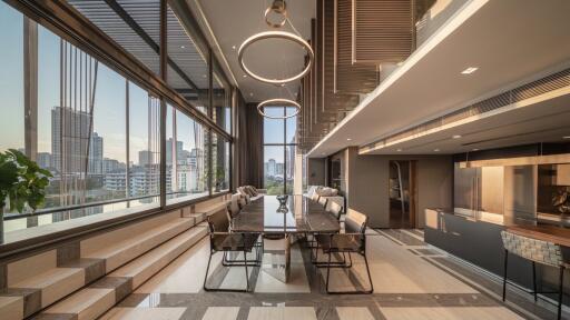 Modern dining room with large windows and city view