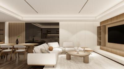 Modern living room with white furniture, a large TV, and a dining area.