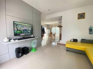 Modern living room with television and seating area