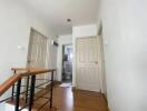 Upstairs hallway with multiple doors