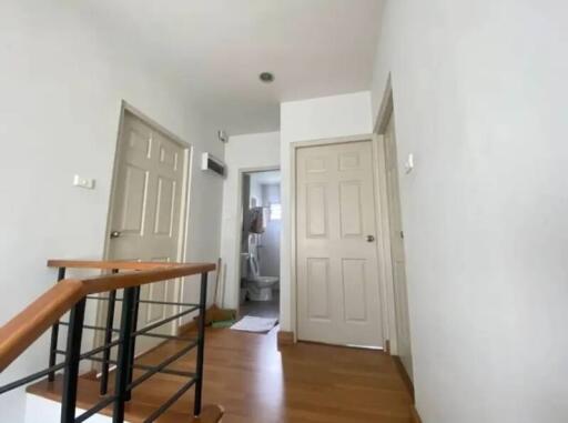 Upstairs hallway with multiple doors