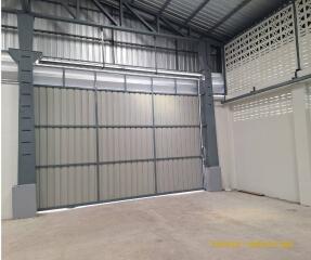 industrial building interior with large metal door