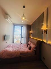 Bedroom with large windows and modern decor