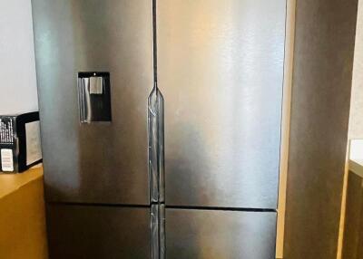 Modern stainless steel refrigerator in a kitchen