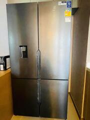 Modern stainless steel refrigerator in a kitchen