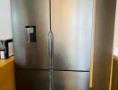 Modern stainless steel refrigerator in a kitchen