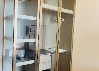 Bedroom with glass wardrobe
