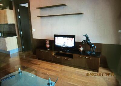 Living room with TV unit and decorative elements