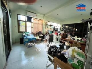 Living room with various items and furniture